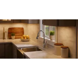 a kitchen with wooden cabinets and a sink