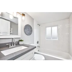 a double sink and large mirror