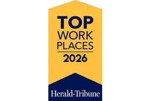 Yellow and navy badge with text 'Top Work Places 2026' awarded by Herald-Tribune. image