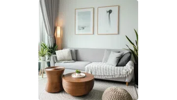 Modern living room with gray sofa, wooden coffee tables, neutral decor, plants, and soft lighting.