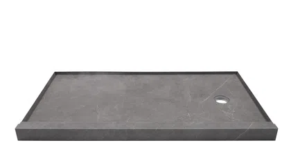 Rectangular gray stone shower base with a raised edge and round drain hole on white background.