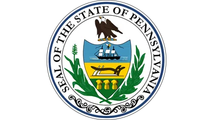 Seal of the state of Pennsylvania with eagle, ship, plow, and three sheaves of wheat on a shield.