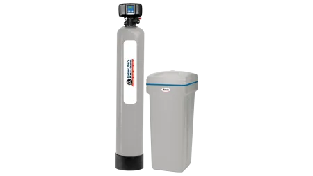 Tall grey water softener tank with control valve and adjacent white brine tank with blue trim.