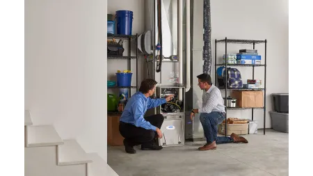a kitchen with white cabinets
