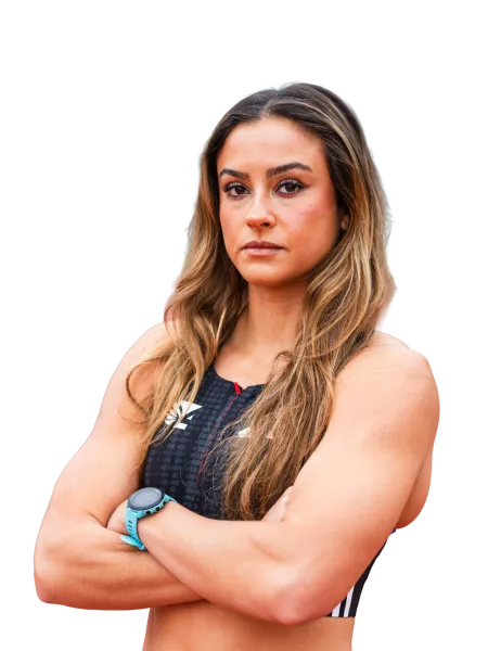 Fit confident woman with long hair in sportswear crossing arms, wearing a smartwatch, isolated on transparent background.