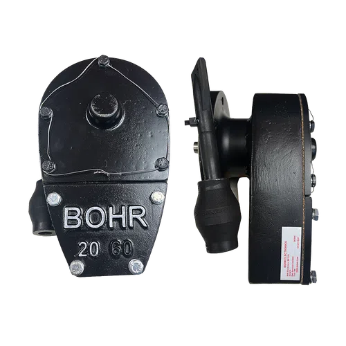 Black mechanical device with embossed BOHR 20 60 and attached components on transparent background
