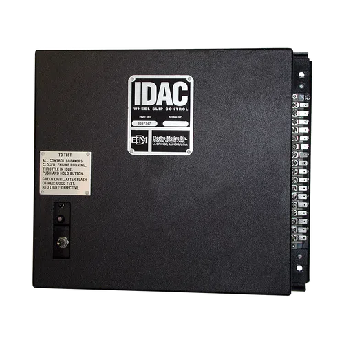 Black IDAC wheel slip control electronic unit from Electro-Motive Division with labels and switches