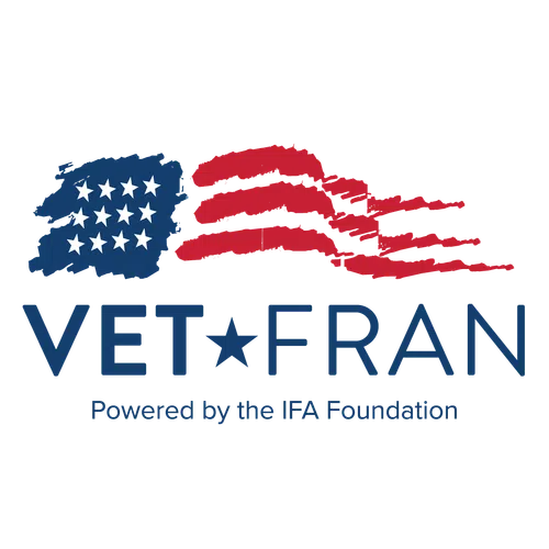 VetFran logo with stylized American flag and text powered by the IFA Foundation in blue and red colors.