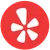 Yelp logo with a red circular background and white stylized starburst in the center.