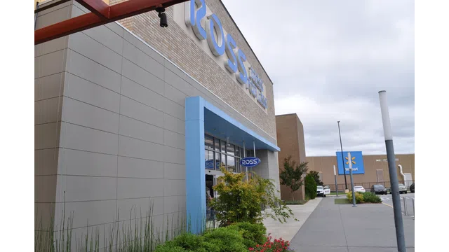 Exterior view of a Ross Dress for Less store with Walmart in the background on a cloudy day