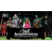 Cast of fantasy characters posing on stage for T