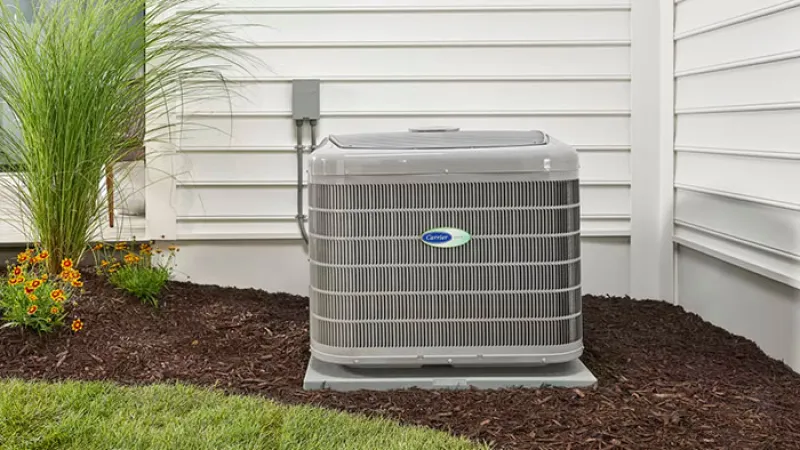 Tech installing Carrier AC