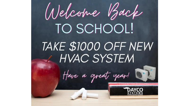 Welcome back to school sign offering $1000 off new HVAC system with apple, chalk, and eraser on wood table.