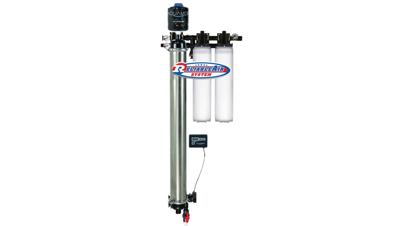 Aquamor water filtration system with dual white filters, stainless steel tank, gauges, and ReliableAir brand label