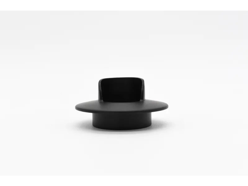 Minimalist black modern chair with a wide circular base and a curved backrest on a white background.