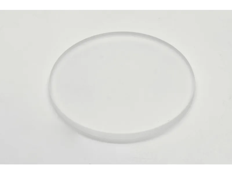 a white plate on a white surface