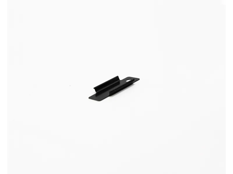 Small black metal clip with a flat base and a raised central latch on a white background