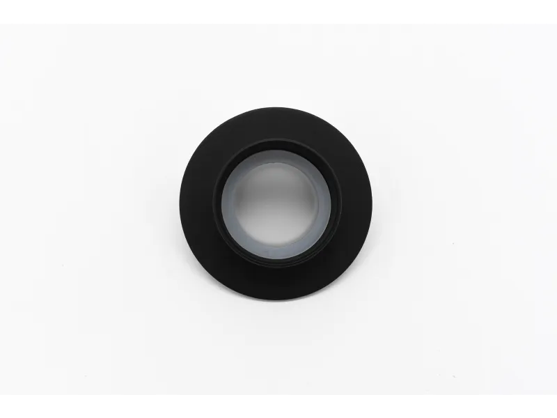 Black circular camera lens mount adapter on a white background, top view showing inner ring and outer flange.