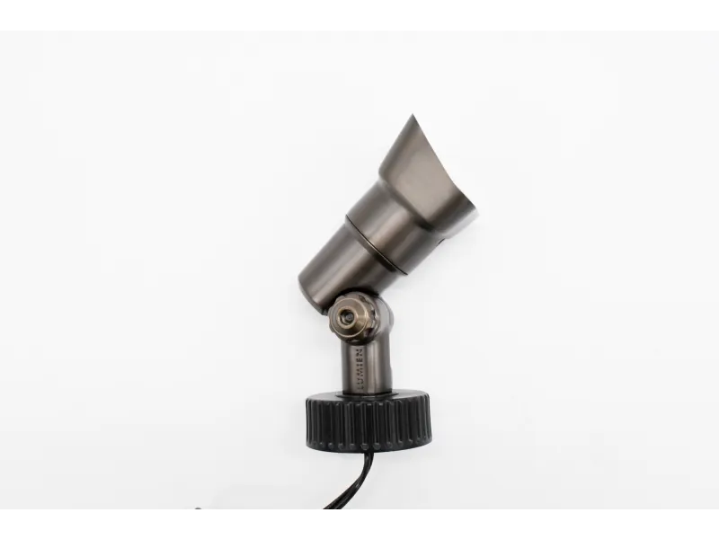 Metallic adjustable spotlight with black base and a white background.