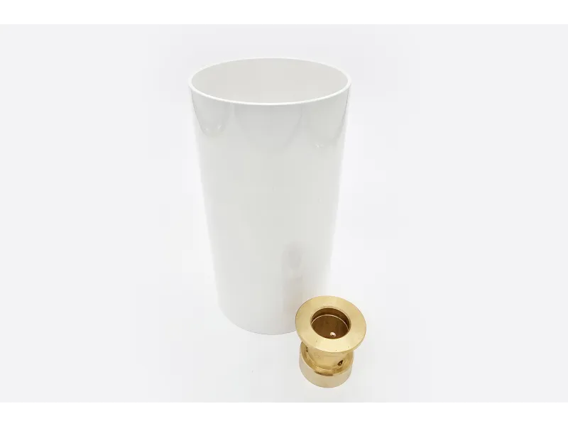 a glass of milk and a roll of toilet paper