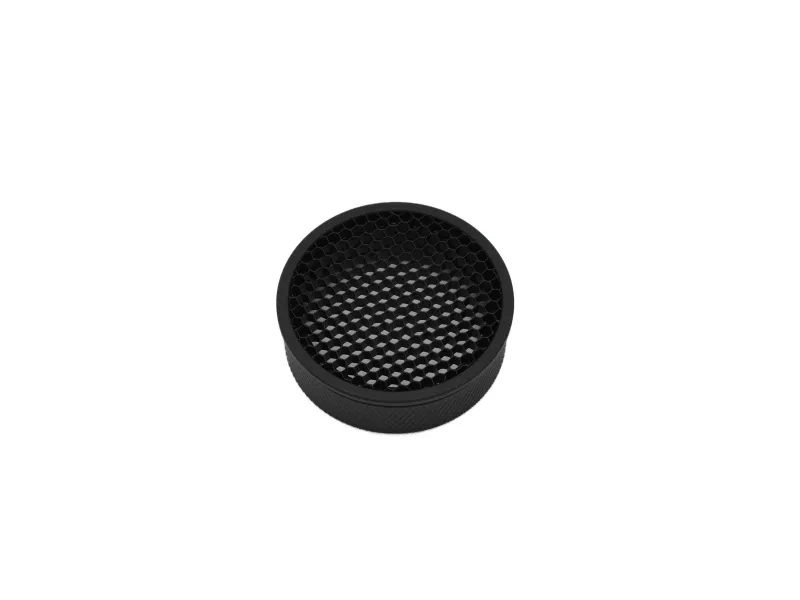 Black circular honeycomb grid filter with textured sides on white background.