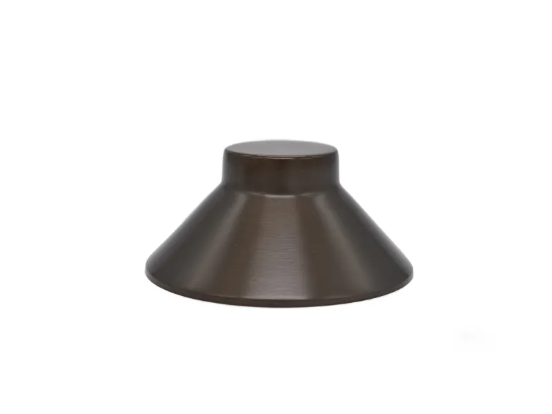 Brown brushed metal conical lampshade with wide base and narrow top isolated on white background