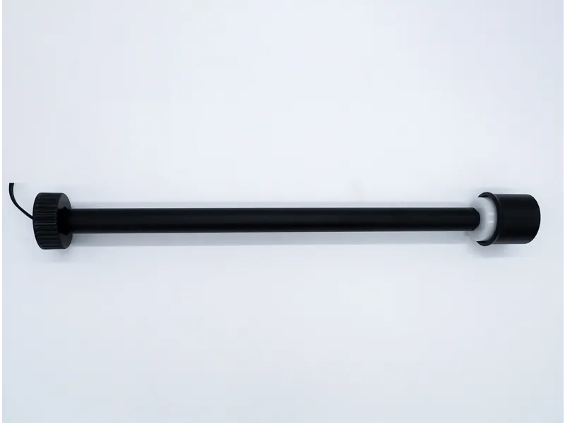 Black cylindrical rod with connectors on each end against white background