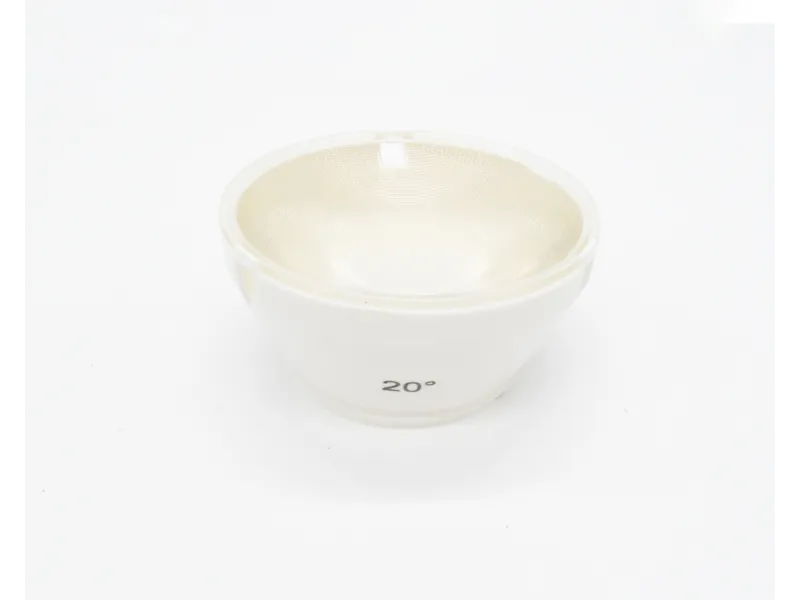 Close-up of a white optical lens with a 20-degree angle marking on a white background.