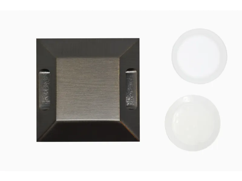 a black box with a white circle and a black circle with a white circle and a white circle