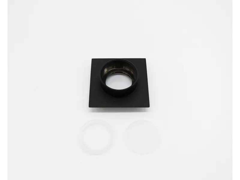 Black square ring mount with two translucent silicone gaskets on a white background.