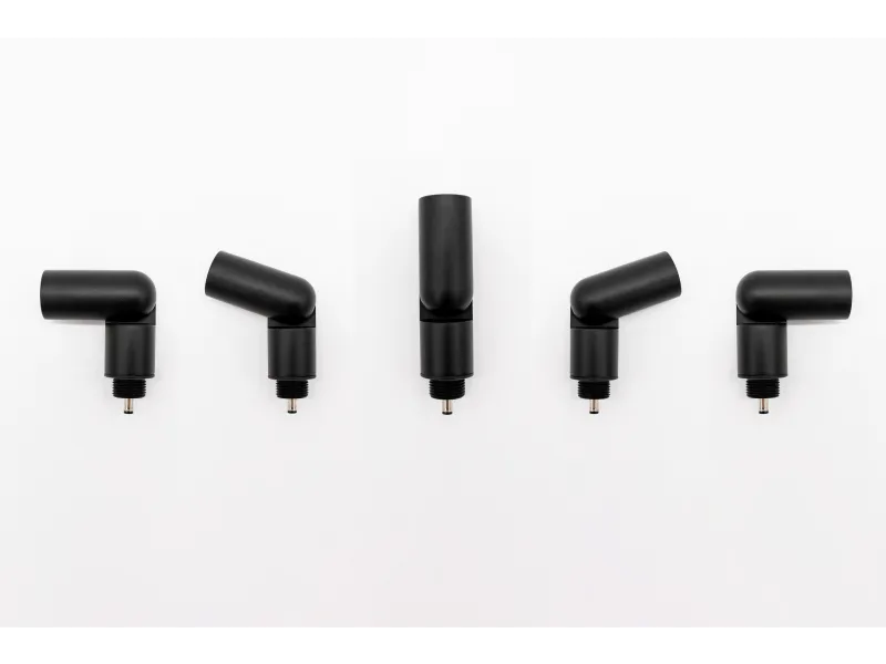 Five black cylindrical connectors with threaded ends arranged in a row on a white background.
