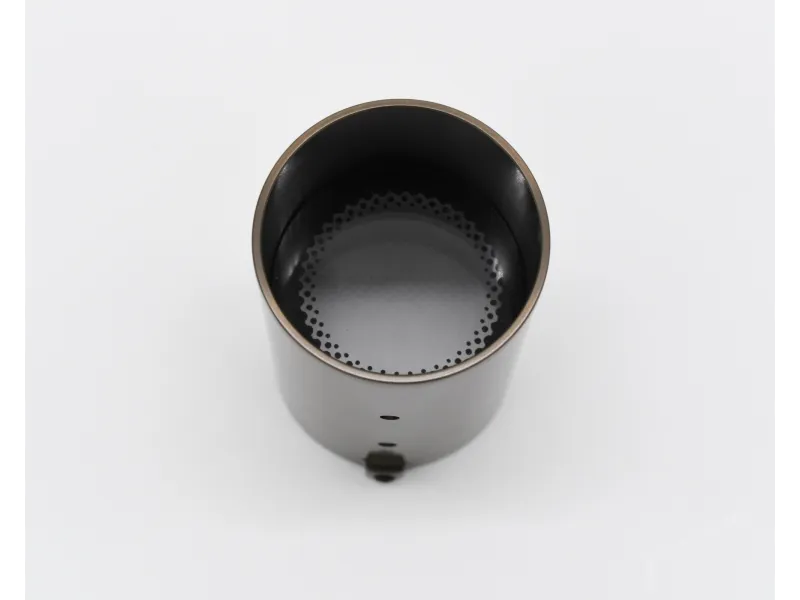 Top view of a black cylindrical container with a perforated circular pattern inside on a white background.