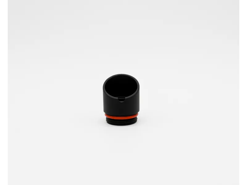 Black cylindrical plastic cap with orange ring and threaded base on white background