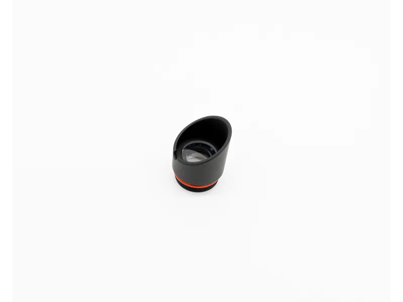 Small black camera lens with red ring on white background isolated photography equipment