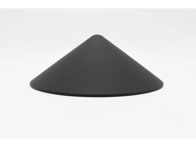 Matte black cone-shaped object with smooth surface on a white background.