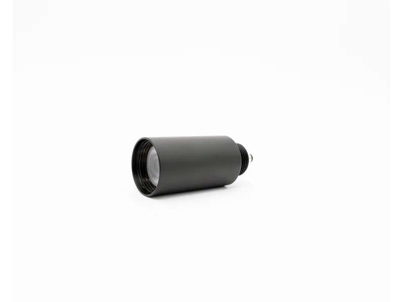 Black compact flashlight with cylindrical shape on a white background.