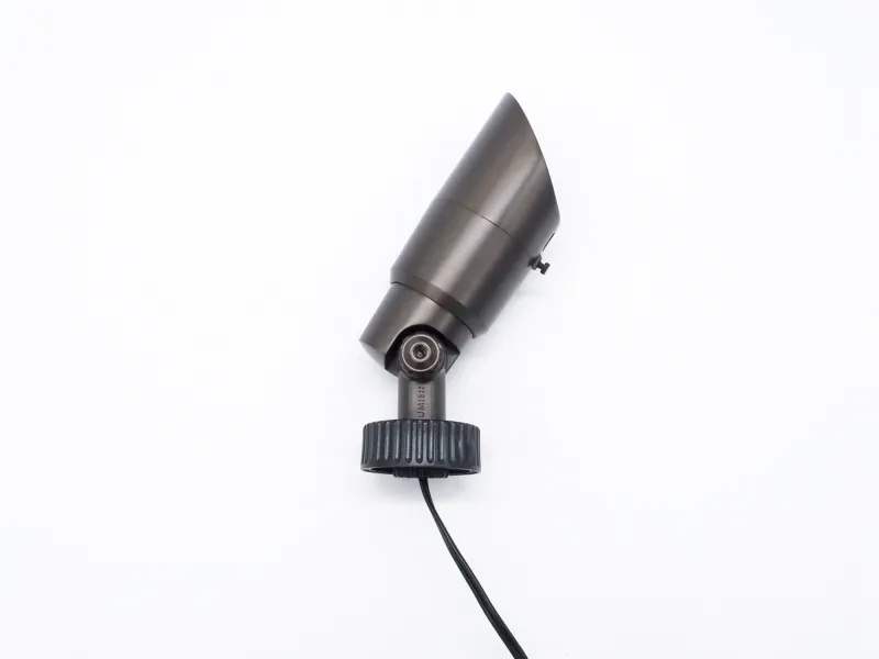 Dark bronze outdoor spotlight with adjustable head and cable on white background