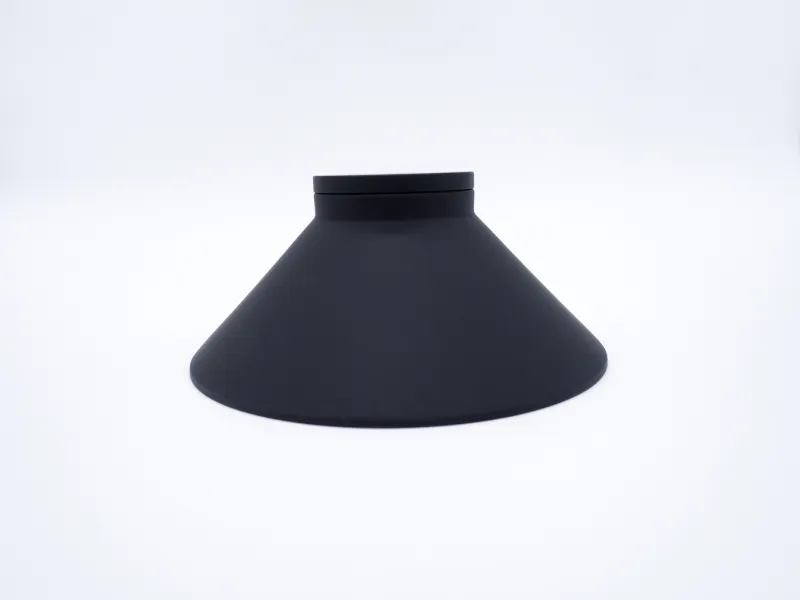 Black conical lampshade with a smooth matte finish isolated on white background.