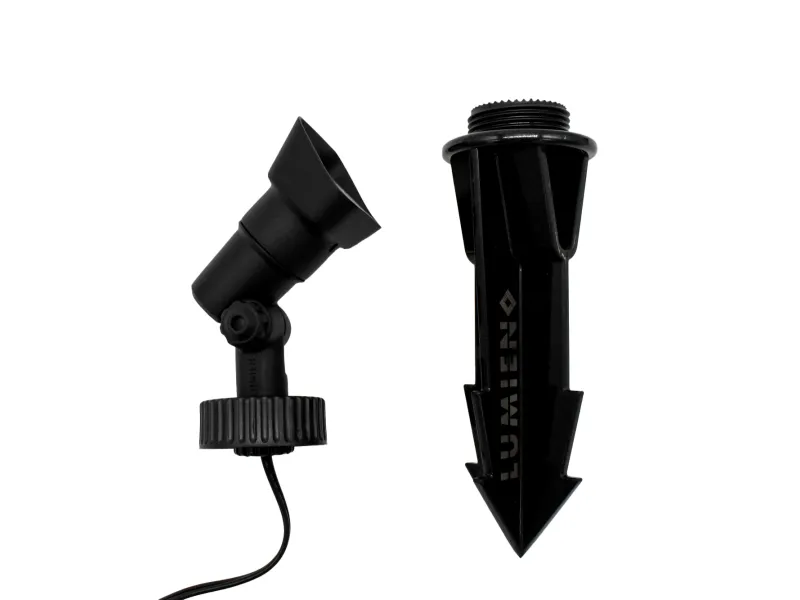 Black outdoor spotlight with adjustable head and ground stake for landscape lighting on white background
