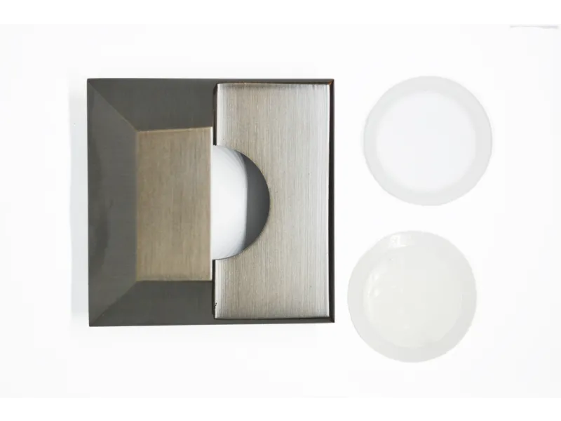 a group of plates and a roll of paper