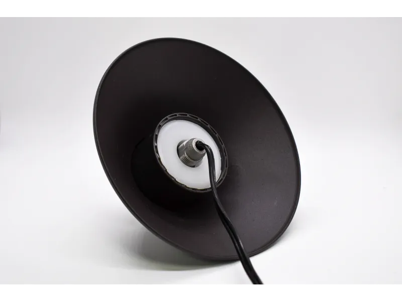 a black speaker with a wire