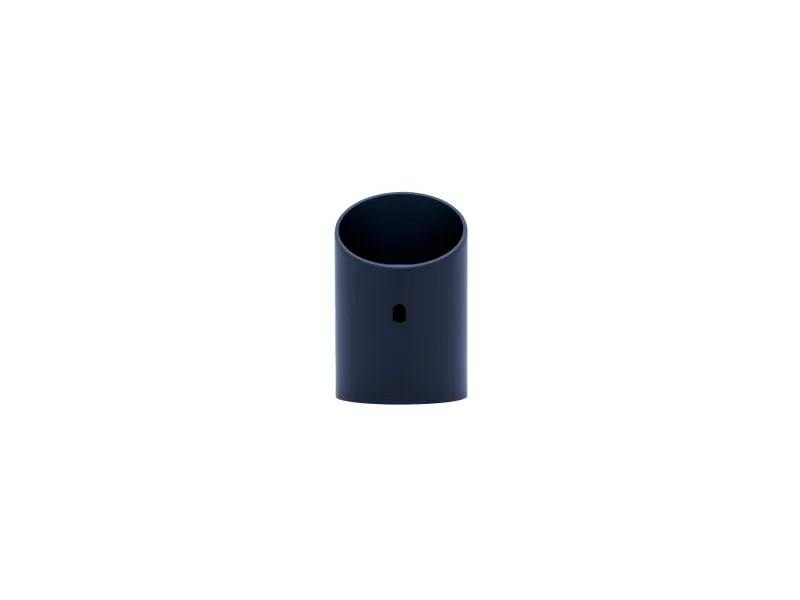 Small black cylindrical plastic cap with a central hole on a white background
