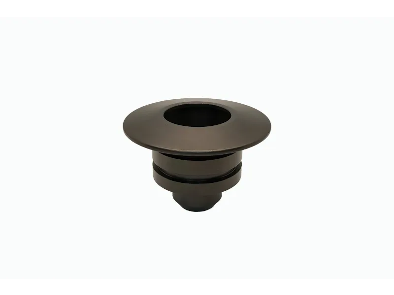 Black metal sink drain assembly with a sleek, modern design and a circular top.