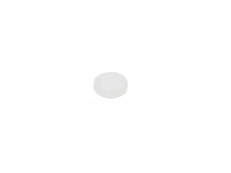 Single white round tablet pill isolated on a white background, medical and pharmaceutical concept.