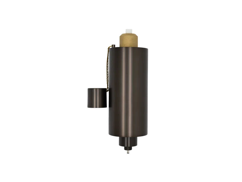 Bronze-colored cylindrical mechanical part with gold knurled top and attached small cap on chain.