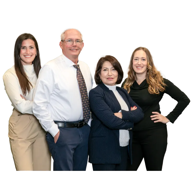 Four diverse business professionals posing confidently in office attire against a transparent background