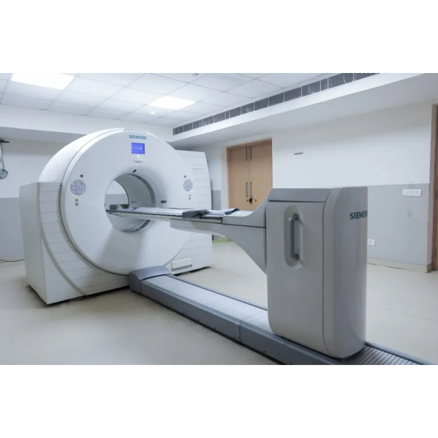 Modern Siemens MRI scanner in a clean, well-lit medical imaging room with a patient bed extended.