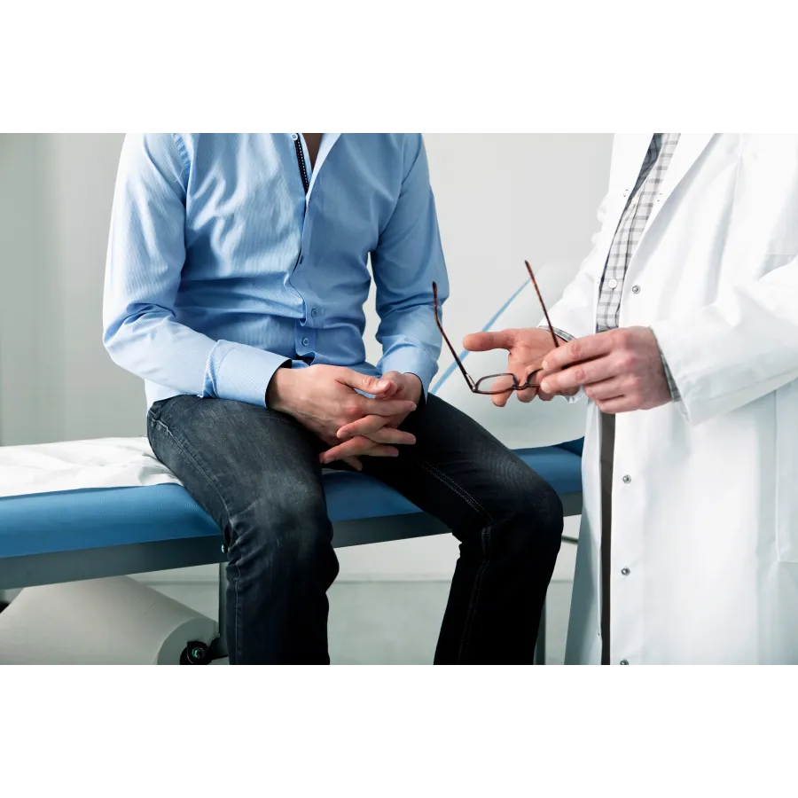 a doctor checking a patient's blood pressure