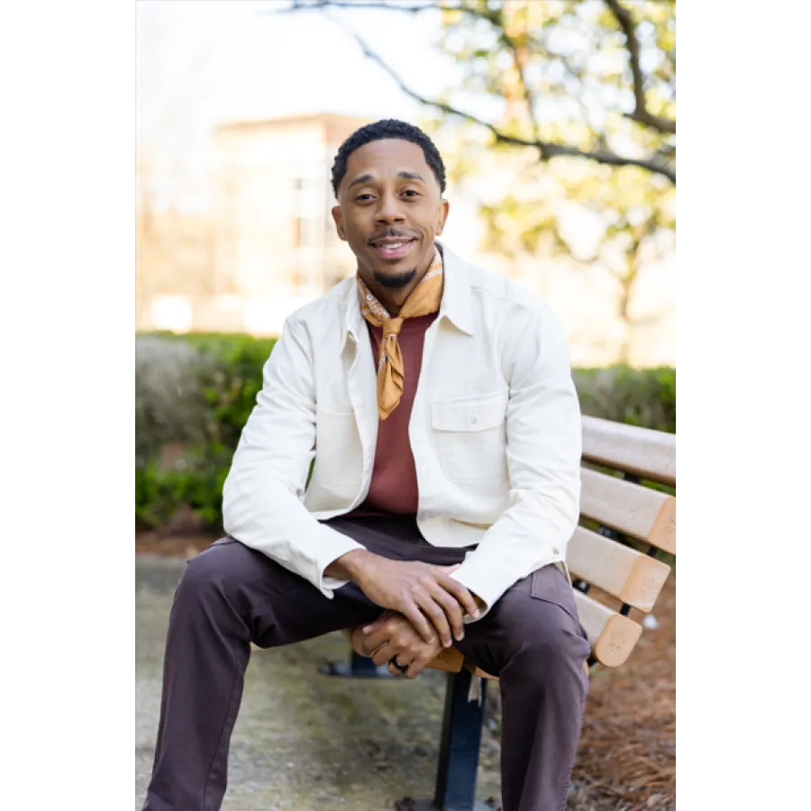 a person sitting on a bench