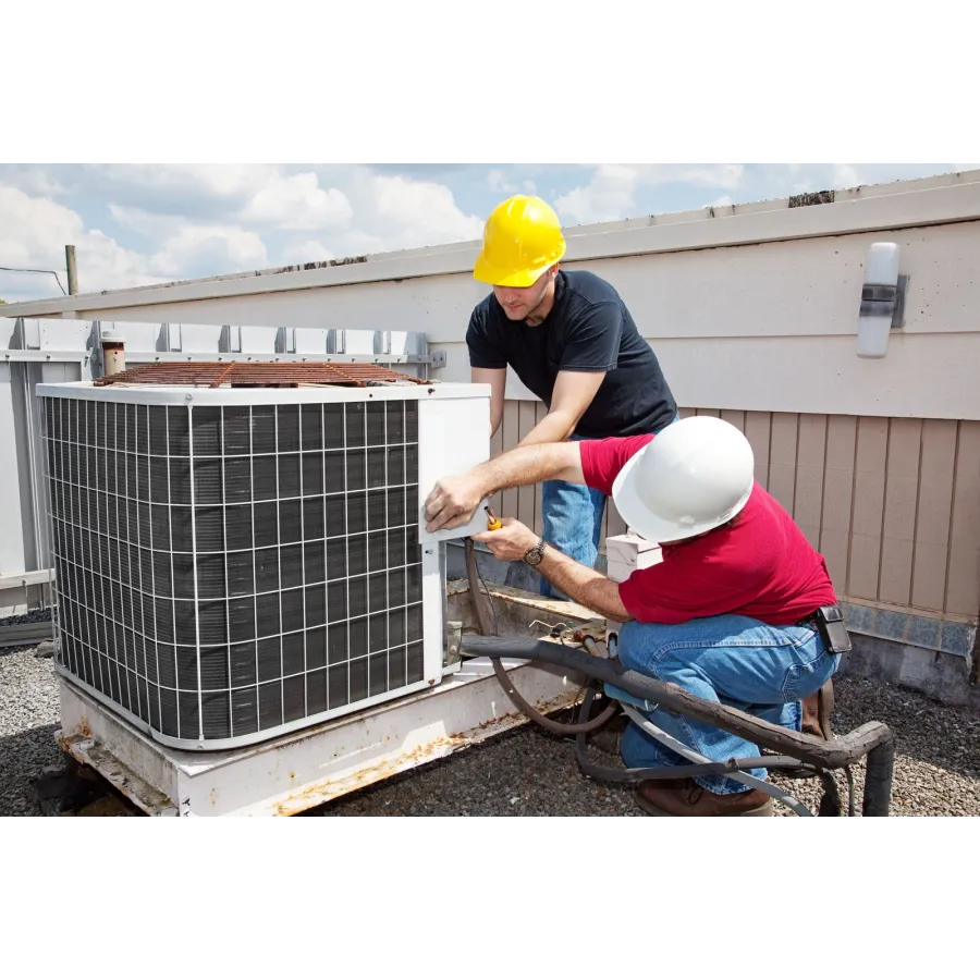 men in hard hats working on a solar panel